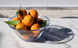 Local clementines, just picked, sunshine, glass, marble...